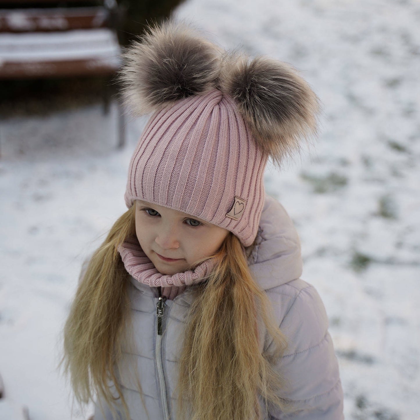 Winter set of hat and tube scarf with two pompoms in cream color